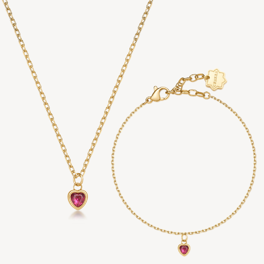 Collier cœur acier inoxydable avec finition en or et cristaux
