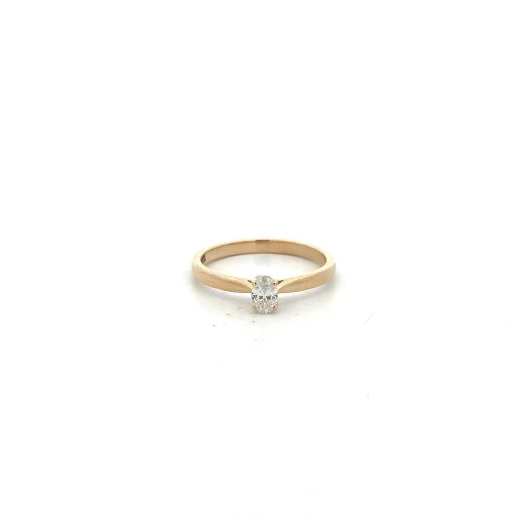 Bague solitaire, or jaune 14 carats, diamant de 21 points, SI/FG