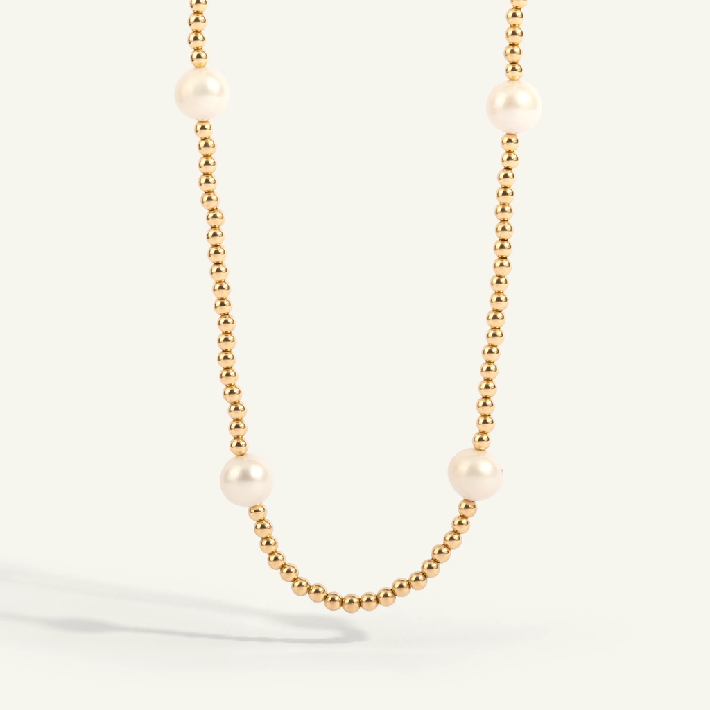 Collier métal doublé d'or 14 carats, perles