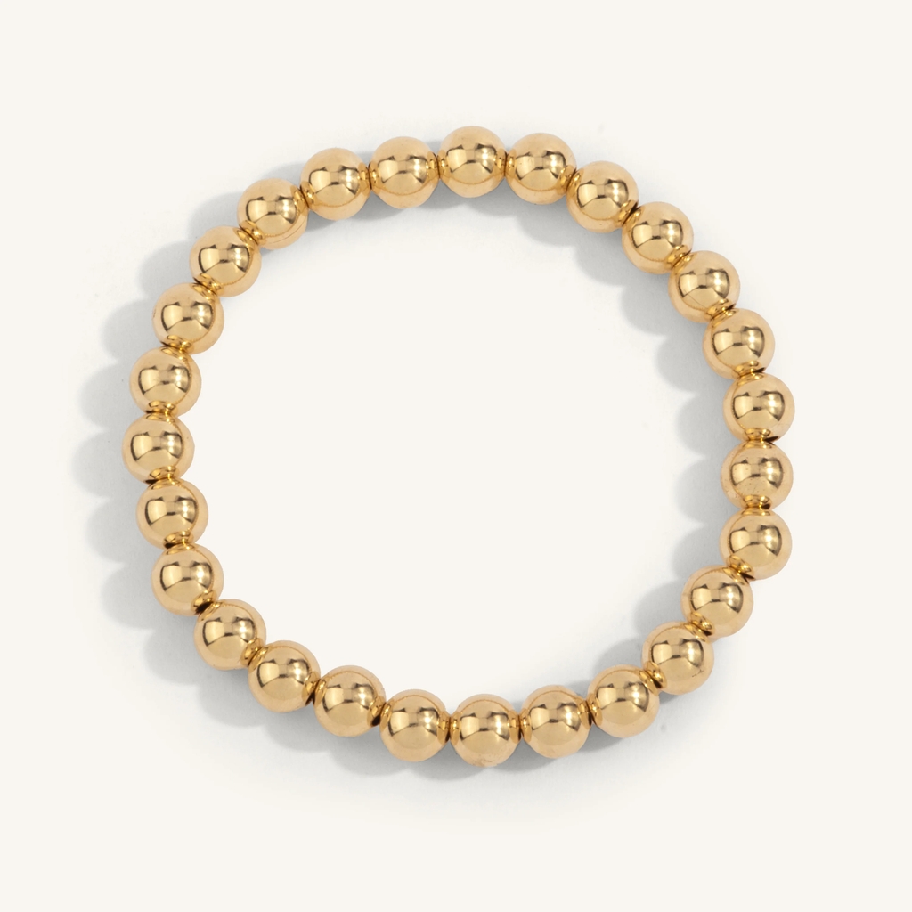 Bracelet extensible, métal doublé d'or 14 carats, 7 millimètres
