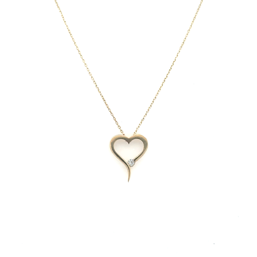 Collier coeur, or jaune 10 carats, zircon incolore