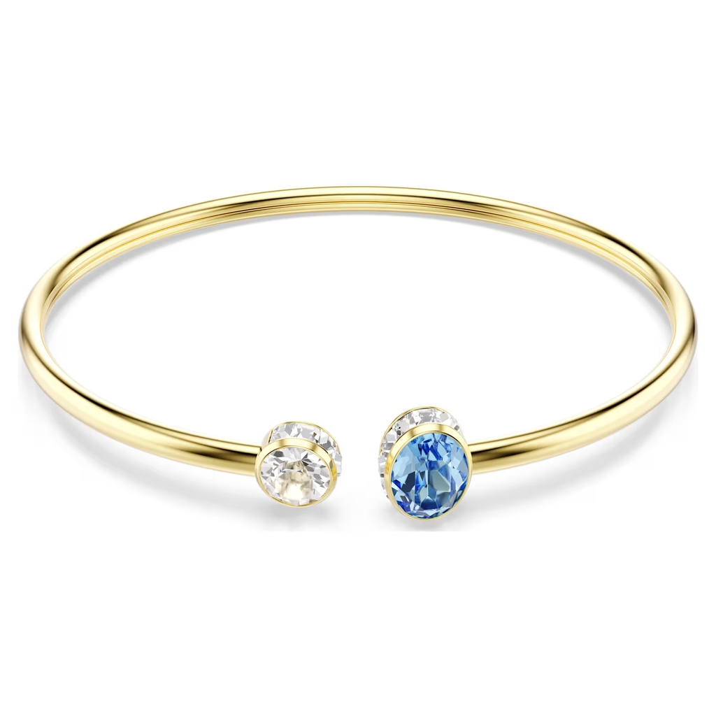 Open bangle bracelet Chroma, gold tone metal, clear crystals and bleu
