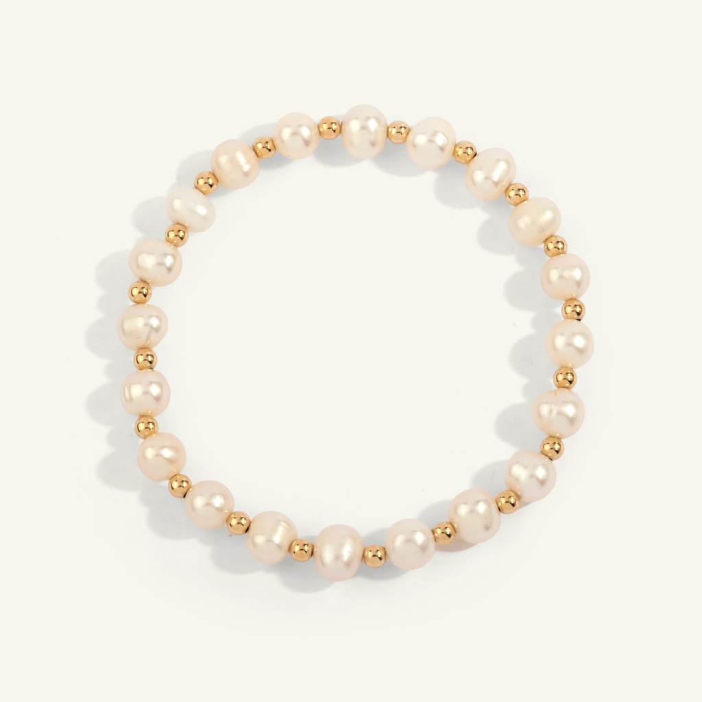 Bracelet extensible, métal doublé d'or 14 carats, perles, 6 millimètres Bracelet extensible, métal doublé d'or 14 carats, perles, 6 millimètres