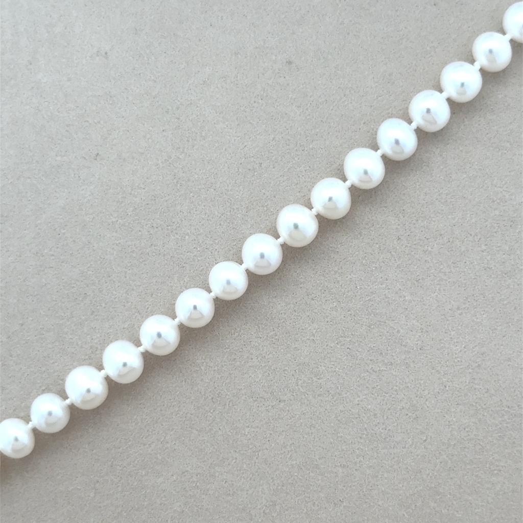 Bracelet or jaune 14 carats perles d’eau douce 6 à 6,5 mm