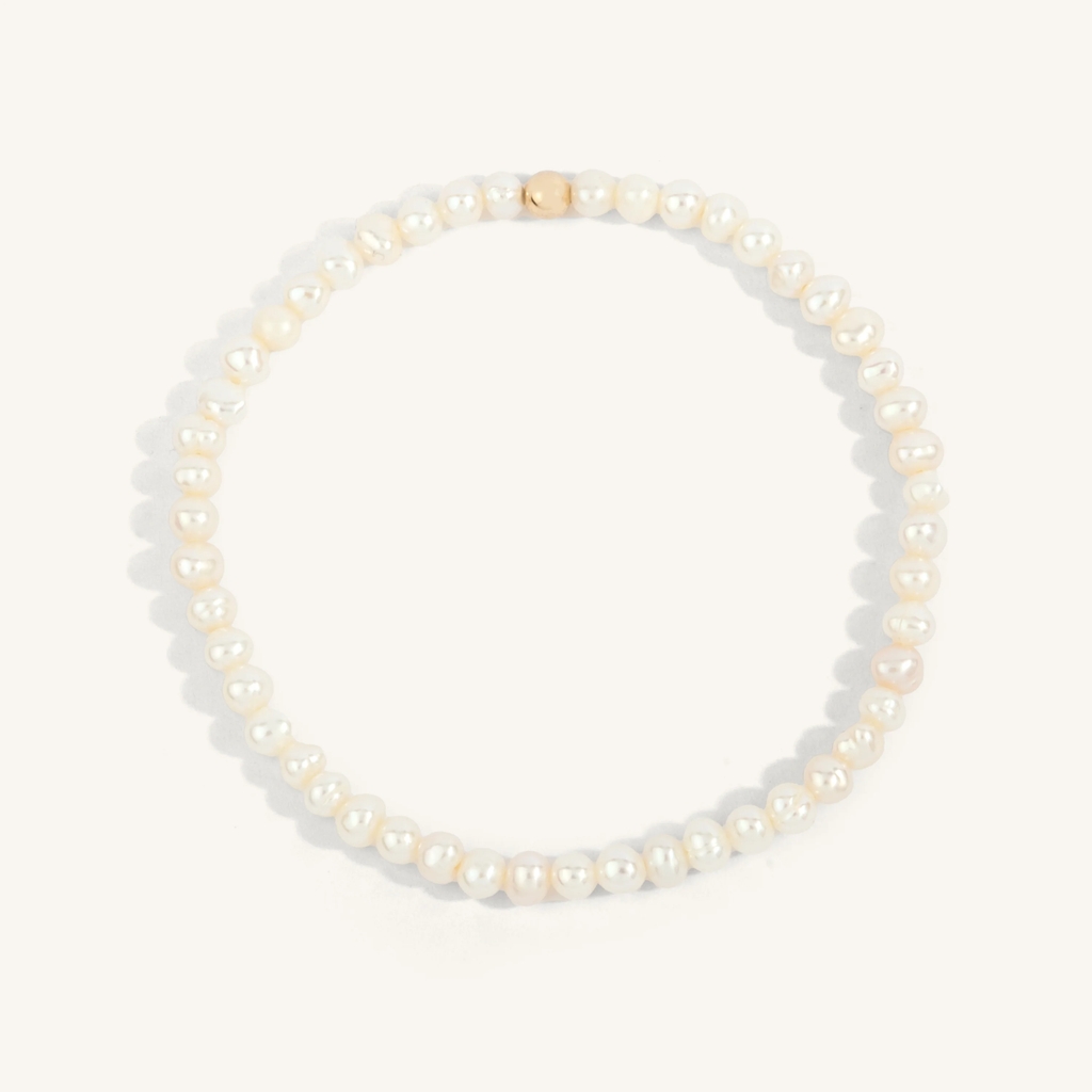 Bracelet extensible, métal doublé d'or 14 carats, perles, 4 millimètres Bracelet extensible, métal doublé d'or 14 carats, perles, 4 millimètres