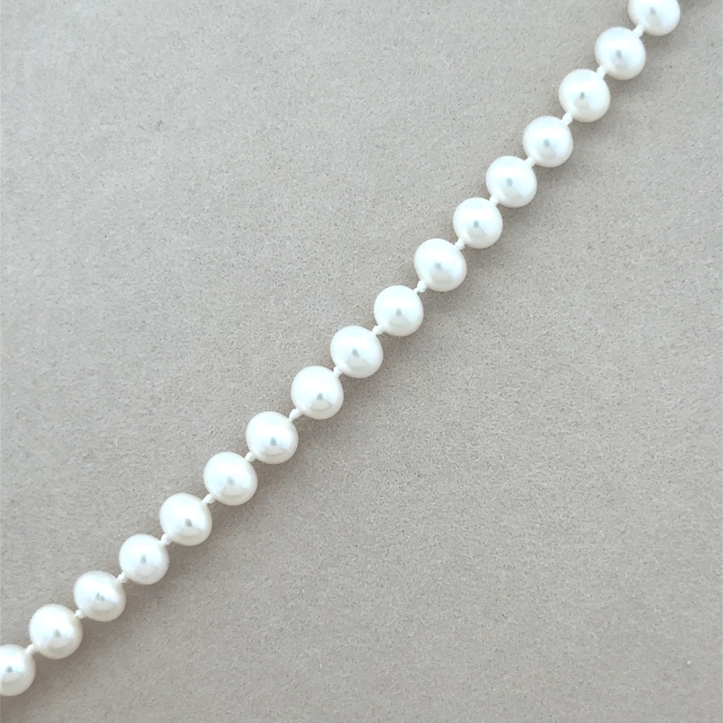 Bracelet or jaune 14 carats perles d’eau douce 5 à 5,5 mm