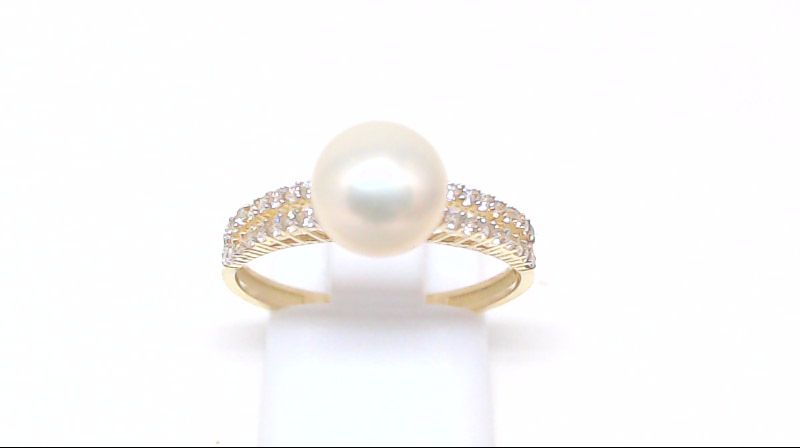 Bague en or jaune avec perle et zircons Bague en or jaune avec perle et zircons